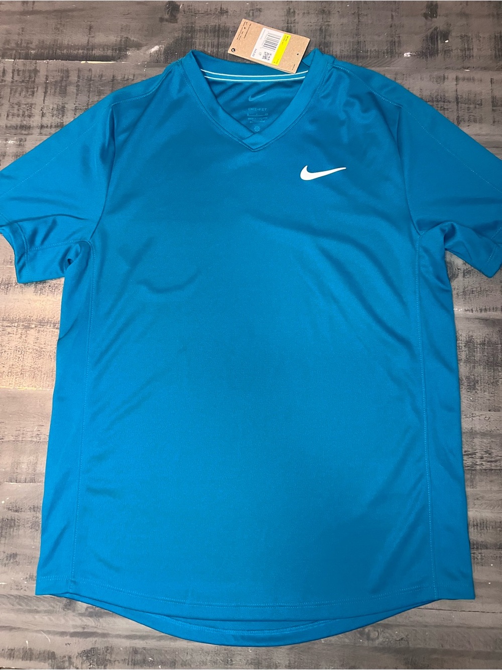 Nike Men's V-Neck Short Sleeve Athletic Tee in Bright Blue with White Swoosh